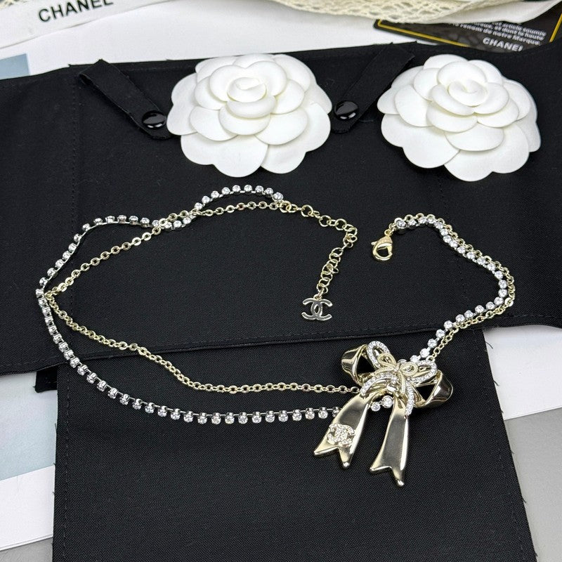 18K  Chanel 25K Bow Tie Diamond Gold Necklace